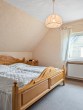 Schlafzimmer DG - Werz Immobilien - Großzügiges Zweifamilienhaus mit malerischer Aussicht