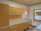 Küche EG - Werz Immobilien - Panoramablick – Einfamilienhaus mit Einliegerwohnung und flexiblem Raumkonzept