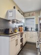 Küche - Werz Immobilien - Eigentumswohnung mit Wintergarten