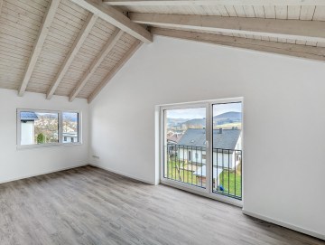 Attraktives Immobilienportfolio mit 3 EFH, 4 DHH und 1 MFH - DHH Schlafzimmer - Werz Immobilien (27160)