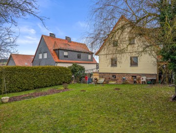 Einfamilienhaus mit Platz für die ganze Familie! - Garten - Werz Immobilien (25963)
