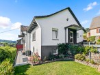 Impresssionen - Einfamilienhaus mit Einliegerwohnung, Partykeller und Traumgarten