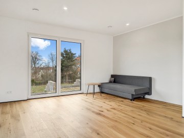 Einziehen statt Bauen! KfW55 mit Energieeffizienzklasse A+ - Wohnbereich - Werz Immobilien (27830)