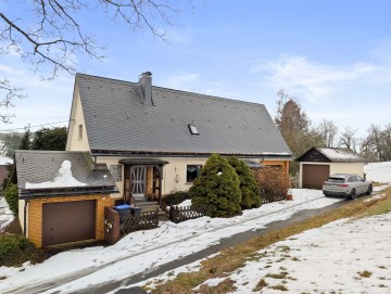 Landleben-Idylle: Charmantes Einfamilienhaus in malerischer Lage - Titelbild - Werz Immobilien (27692)