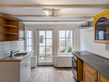 Liebevoll gepflegtes Fachwerkhaus mit modernem Wohnkomfort in ländlicher Idylle - Küche -Werz Immobilien (26380)